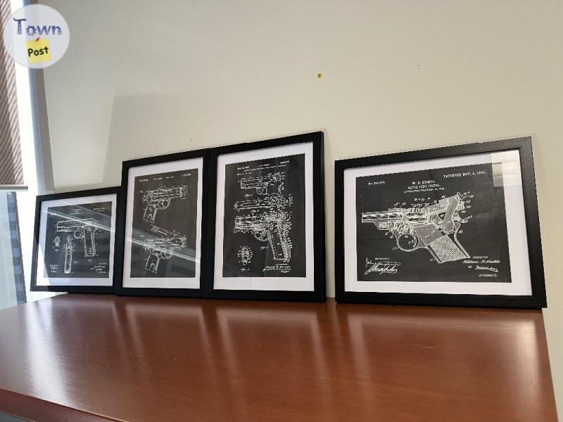 Photo of Framed blueprints of historical guns