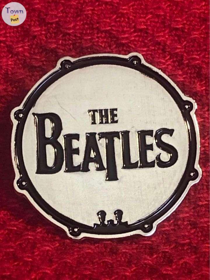 Photo of The Beatles drum enamel pin back 1 1/4inch