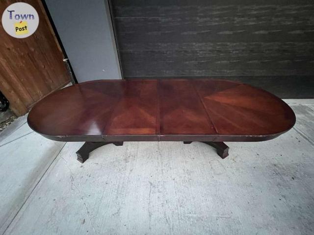 Photo of Large Dark Brown Wooden Dining Table