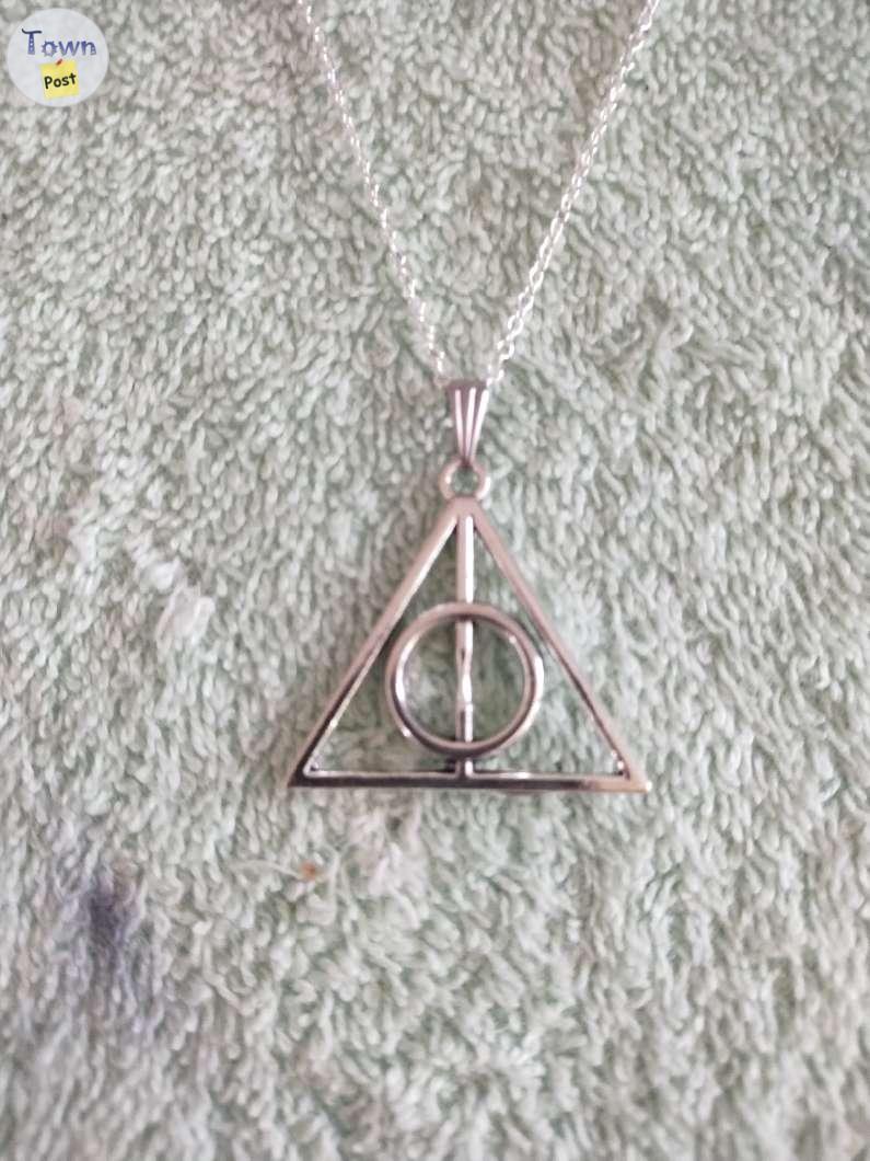 Photo of Deathly Hallows necklaces 