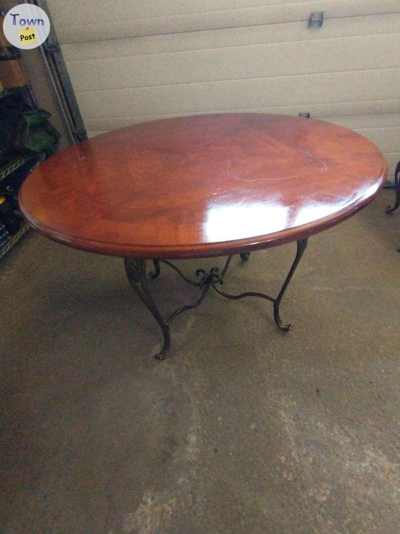 Photo of 47 inch Solid Cherrywood and Wrought Iron Kitchen Table