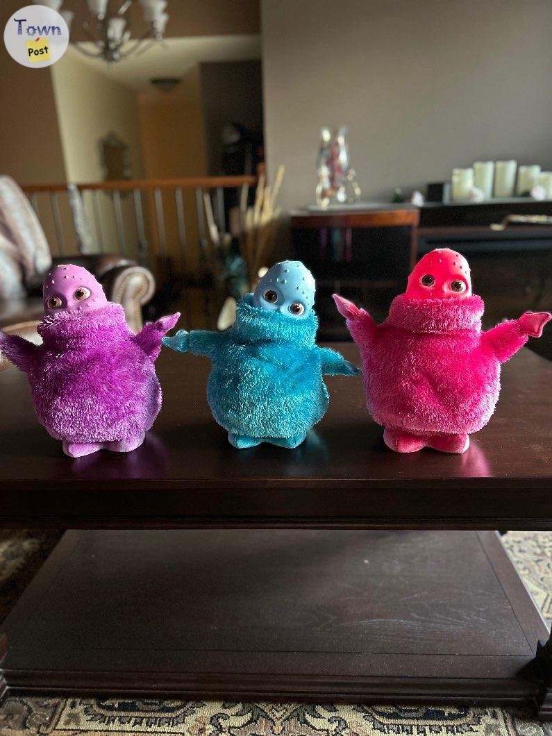 Photo of Kids toys (blue, purple, pink Boohbah soft toys)