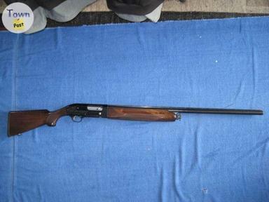 Photo of Beretta Model 301 Semi auto 12GA - 1