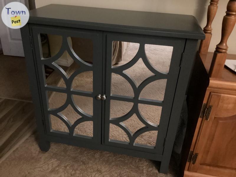 Photo of STORAGE CABINET WITH GLASS FRONT BRAND NEW