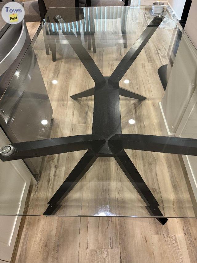 Photo of GLASS TOP DINING TABLE