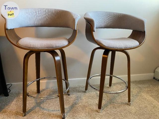 Photo of Two swivel kitchen chairs 