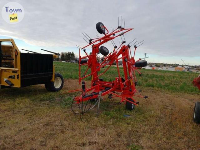 Photo of Kuhn GF 7802 THA pull-type rotary tedder