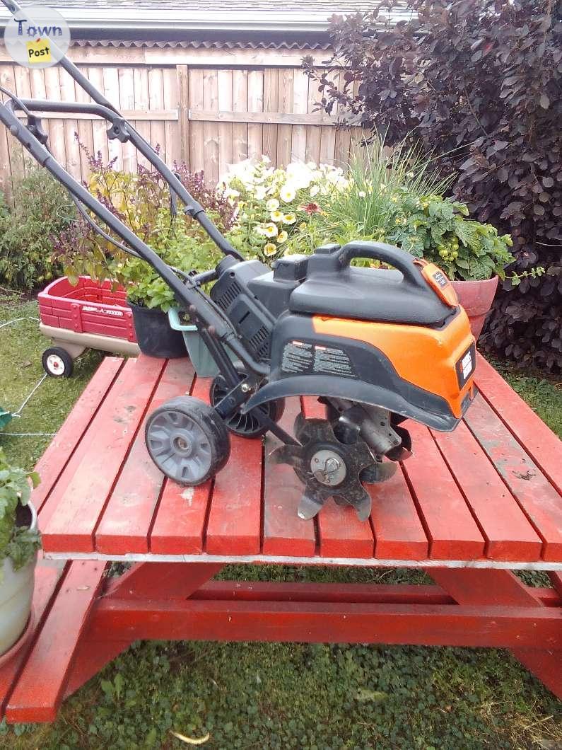 Photo of Rototiller. Blackened Decker 