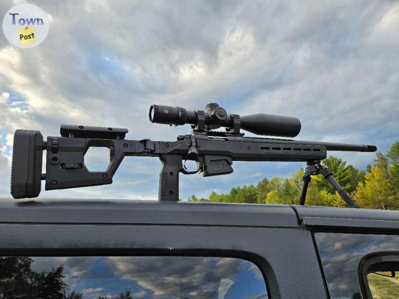 Photo of CUSTOM REMINGTON 700 6.5CM TACORD