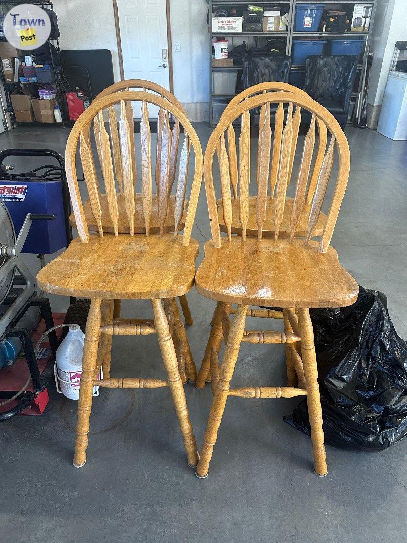 Photo of Four oak bistro/bar chairs