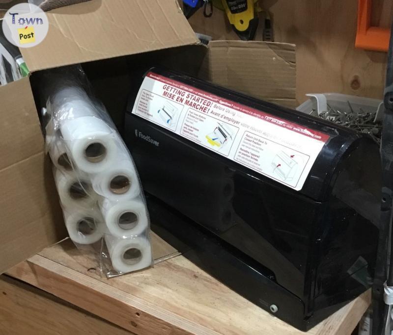 Photo of Vacuum sealer. With bags 