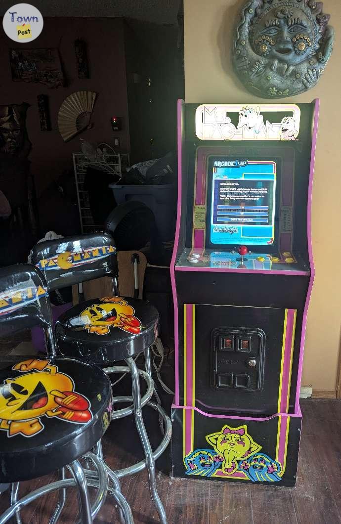 Photo of Ms. Pac-man Arcade and 2 Pac-Man stools with back