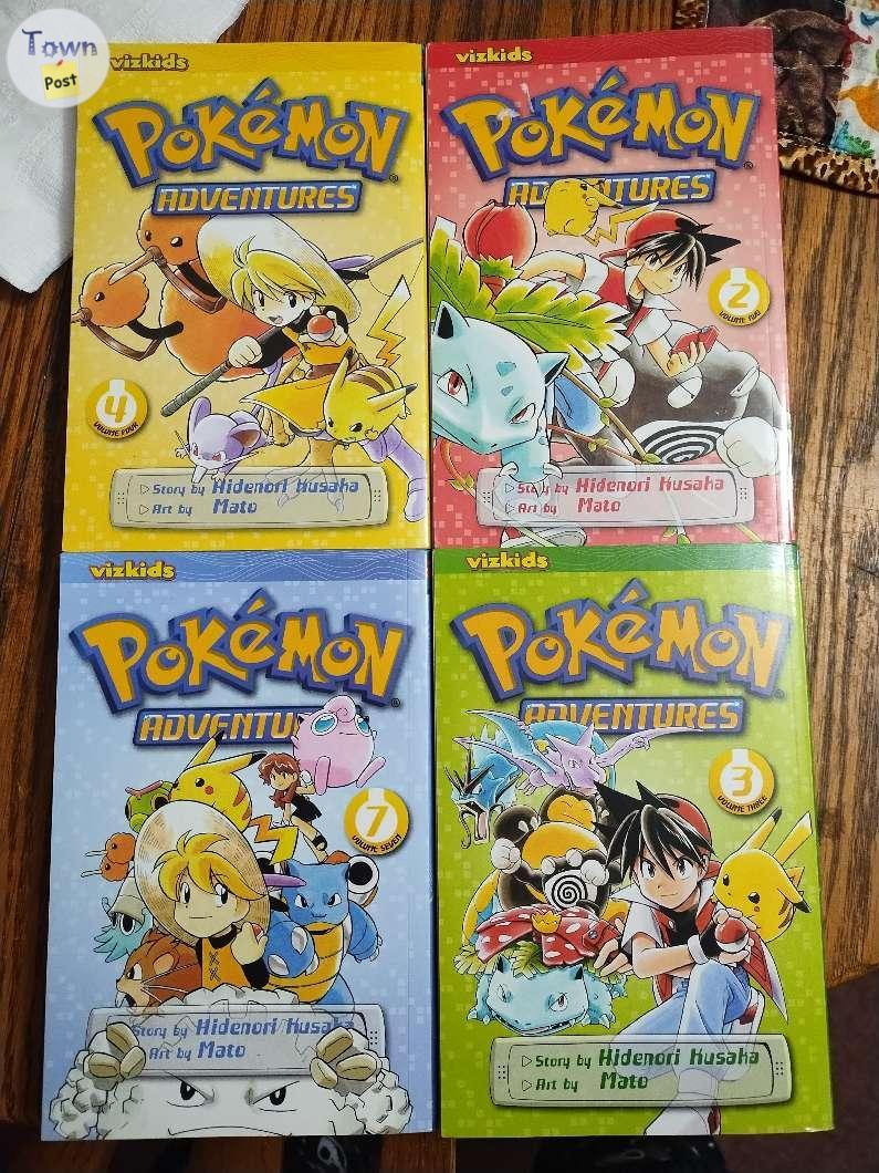 Photo of 4 Pokemon adventures books 