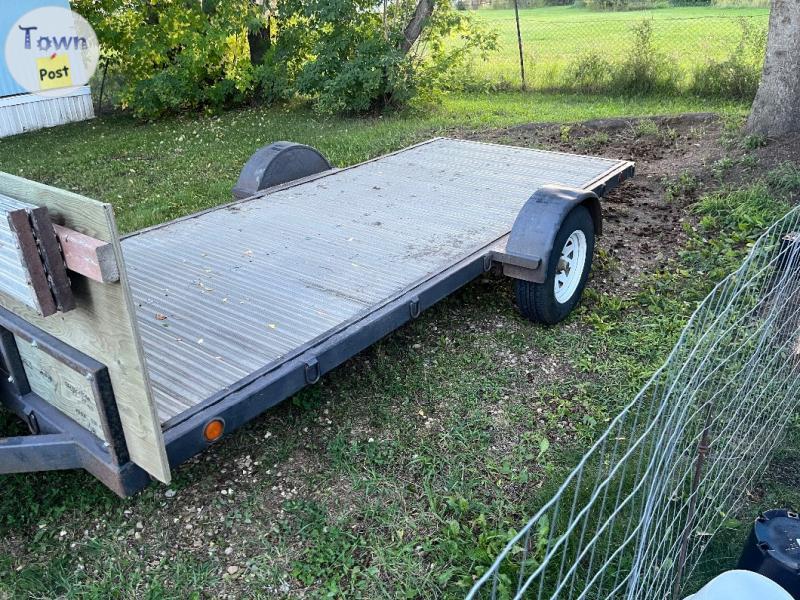 Photo of Flat deck utility trailer 