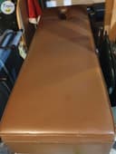 Photo of Massage table with Leather covering. Solid table.