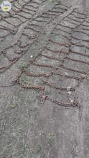 Photo of 11 24.5 truck tire chains.