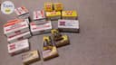 Photo of empty ammo boxes