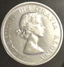 Photo of 1962 PL Canada Silver Dollar, Silver Quarter, Silver Dime, and nickel.