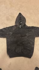 Photo of Wrmfzy black Rhodesian brushstroke sweater