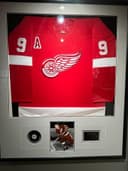 Photo of Mr Hockey Gordie Howe signed framed jersey, numbered