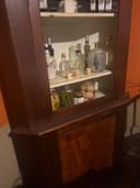 Photo of Wooden corner cabinet,