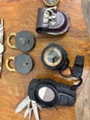 Photo of Misc revolver grips,compass,multi tool,DU watch