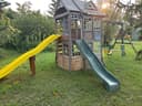 Photo of Wooden Playhouse/Swingset