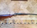 Photo of antique double barrel shotgun 12 g
